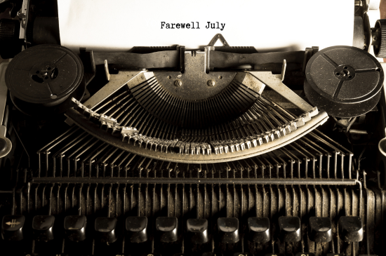 Typewriter with text on paper that says "farewell July"